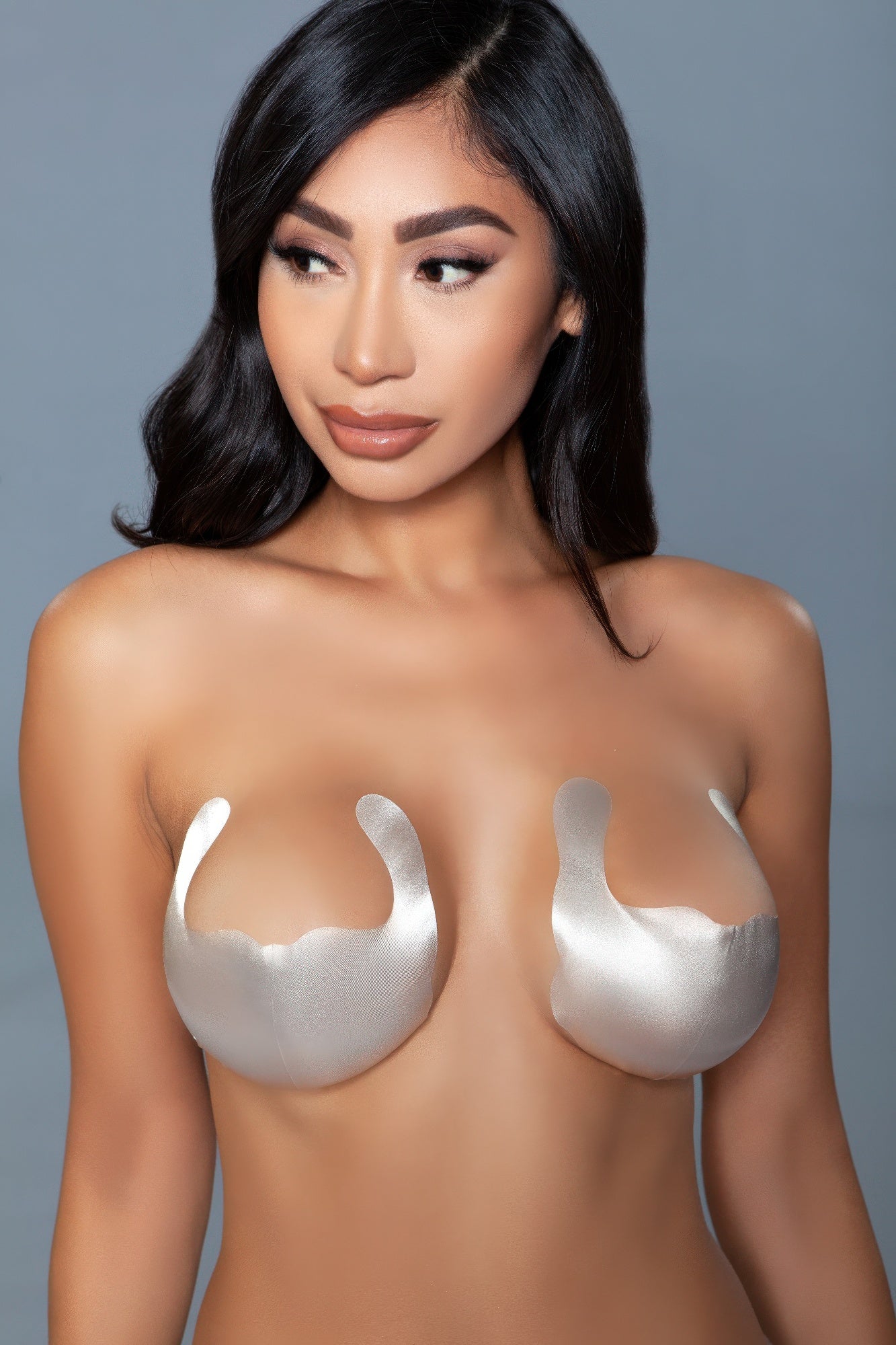 Think Posh Luxury E-Commerce adhesive bra petals in nude color providing discreet coverage for outfits