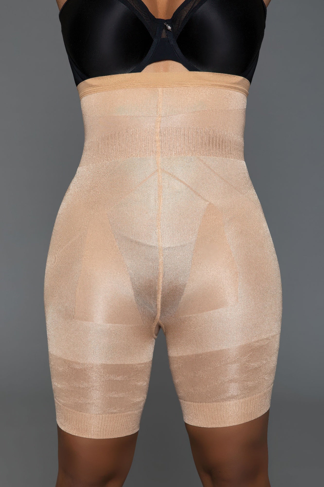 Beige comfortable body shaper for women with high waist design and smoothing support