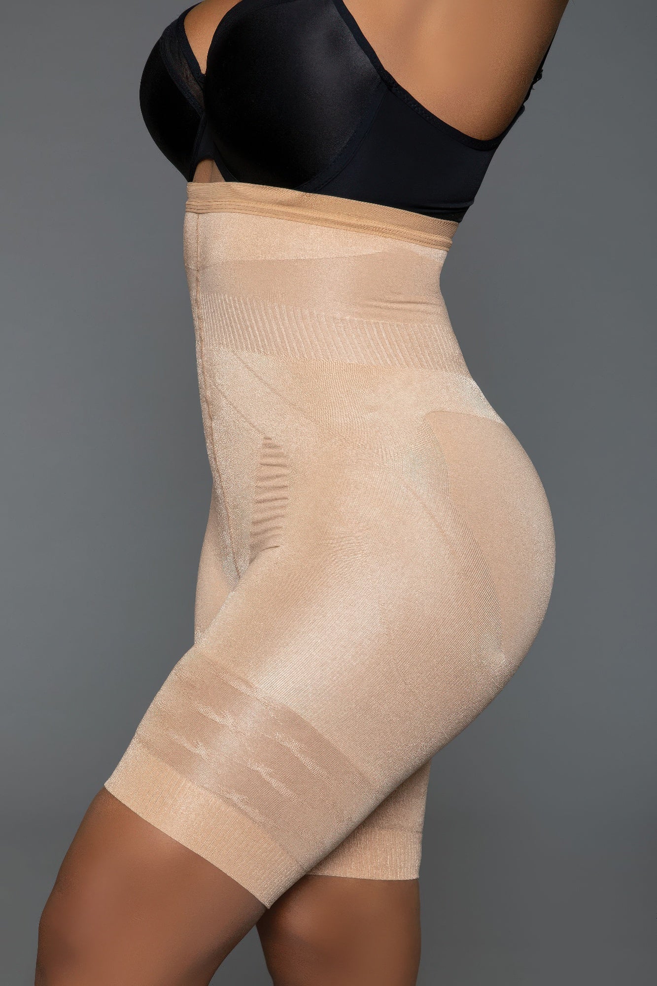 Beige comfortable body shaper for women with high-waisted design for a smooth silhouette