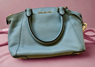 Stylish blue Michael Kors handbag bundle with sleek design and gold hardware for luxury fashion lovers