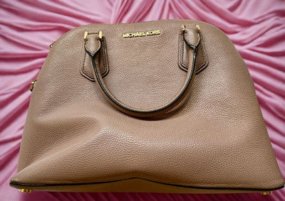 Michael Kors handbag bundle featuring a spacious taupe leather handbag with gold accents