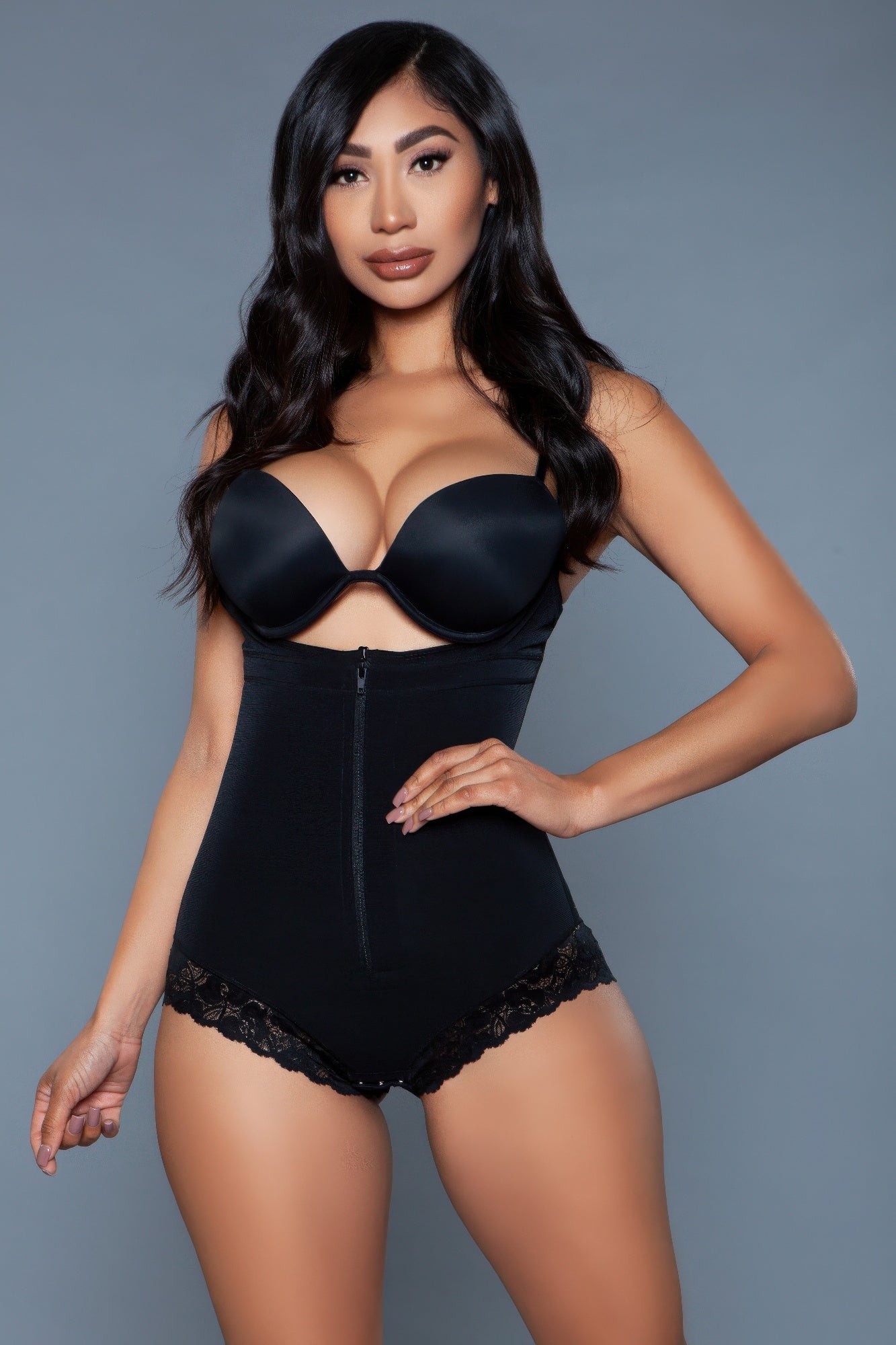 Black seamless body shaper bodysuit with lace trim and front zipper for a sleek silhouette