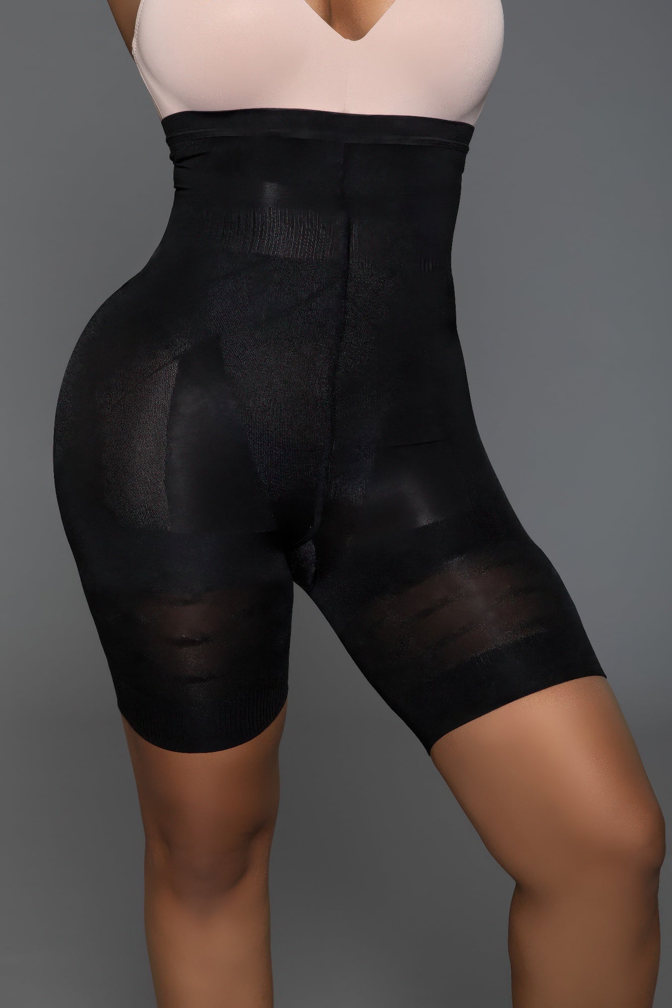 Black comfortable body shaper for women with a high-waisted design for a smooth silhouette