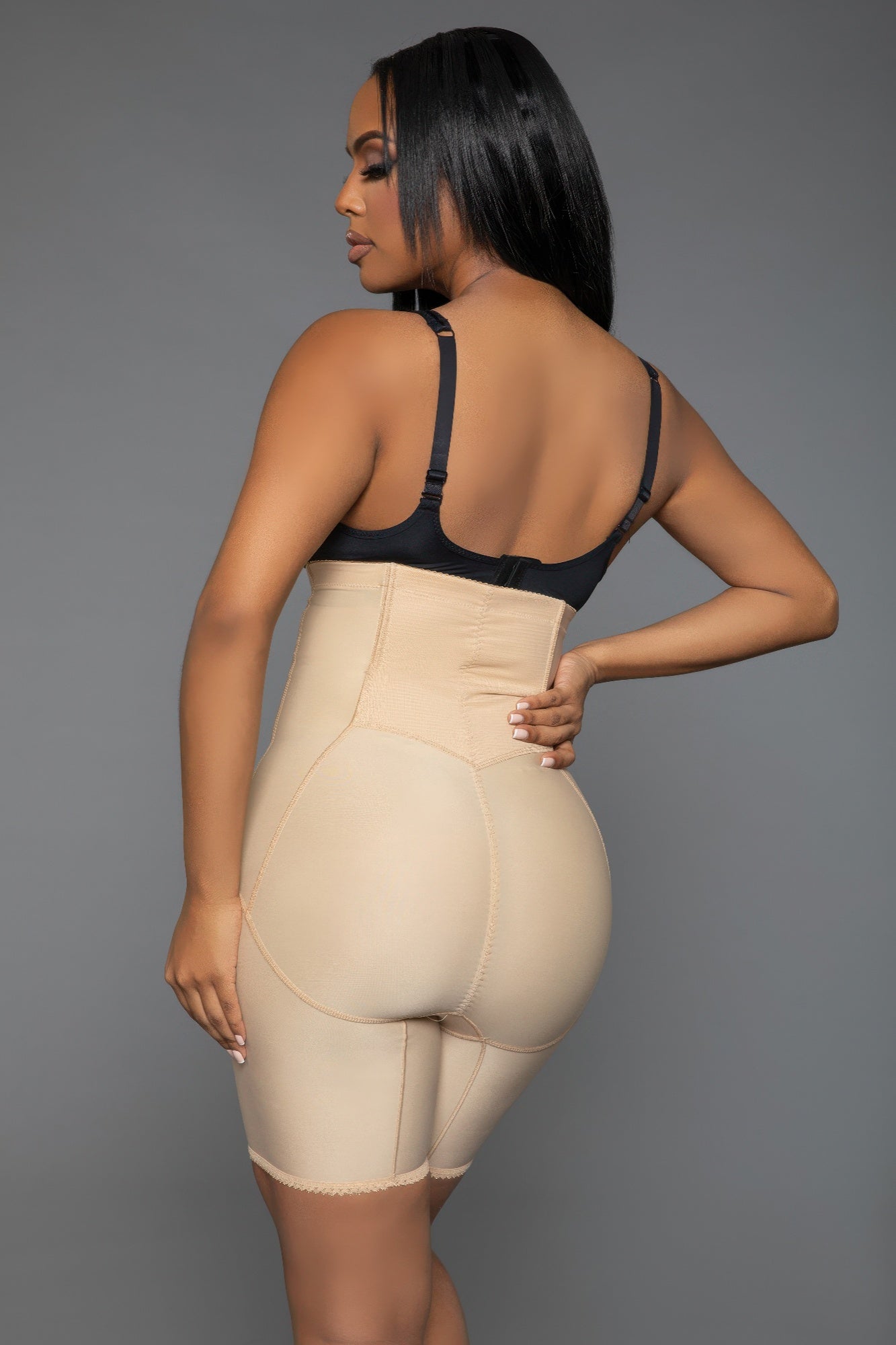 Curve-enhancing shapewear in nude color, designed to smooth and shape the body for a flawless silhouette