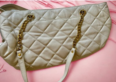 Stylish Michael Kors handbag bundle in quilted design with gold chain accents